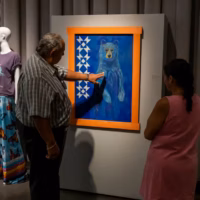 Artist Brooke Waldron's bear painting titled “We Look to the Stars, and Find Ourselves” was on display at the opening reception of “Ascending: The Liberation of Native Art” at the WaterFire Arts Center in Providence. Photo by Scott Foster